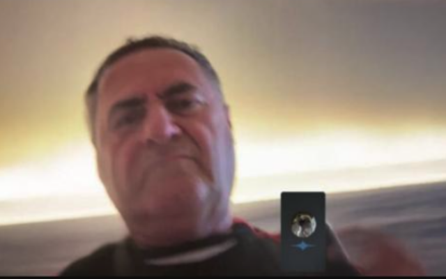 Defense Minister Israel Katz picks up a video call from a Turkish prankster on September 10, 2025. (Screen capture/Courtesy)